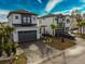 Modern two-story homes with gray roofs and paver driveways at 6706 Ocean Breeze Loop, Myrtle Beach, SC 29577