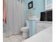 Well-lit bathroom with white vanity and a shower/tub at 712 Algonquin Dr. # A, Pawleys Island, SC 29585