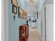 Light blue hallway with decorative items at 712 Algonquin Dr. # A, Pawleys Island, SC 29585