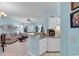 Open kitchen with granite countertops and a breakfast bar at 712 Algonquin Dr. # A, Pawleys Island, SC 29585