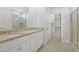 Bathroom boasts double sinks, granite countertops, and a walk-in shower at 865 Summer Starling Pl., Myrtle Beach, SC 29577