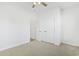 Bedroom with double doors leading to a hallway and carpet flooring at 865 Summer Starling Pl., Myrtle Beach, SC 29577