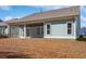 House exterior with a screened porch and landscaping at 865 Summer Starling Pl., Myrtle Beach, SC 29577