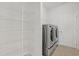 Laundry room with shelving and a washer and dryer at 865 Summer Starling Pl., Myrtle Beach, SC 29577
