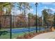 Enclosed tennis court with chain link fence at 865 Summer Starling Pl., Myrtle Beach, SC 29577