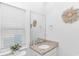 Simple bathroom with single vanity, granite countertop, and modern fixtures at 935 Piping Plover Ln., Myrtle Beach, SC 29577