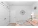 Spacious bedroom with double closet, floral bedding, and simple decor at 935 Piping Plover Ln., Myrtle Beach, SC 29577