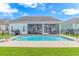 Charming light blue home with screened porch, pool, and fenced yard at 935 Piping Plover Ln., Myrtle Beach, SC 29577