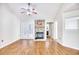 Living room with stone fireplace and hardwood floors at 121 Whitehaven Ct., Myrtle Beach, SC 29577