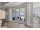 View of a patio through sliding glass doors from the living room at 1255 Winding Creek Way, Myrtle Beach, SC 29588