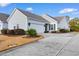 Gray siding house with a two-car garage and manicured lawn at 1541 Palmina Loop # D, Myrtle Beach, SC 29588