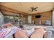 Relaxing screened porch with seating and wood accents at 194 Carlise Way, Myrtle Beach, SC 29579