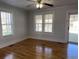 Spacious living area with hardwood floors and lots of natural light at 202 Lewis St., Mullins, SC 29574