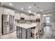 Modern kitchen with stainless steel appliances and white cabinets at 2023 Singing Palm Loop, Little River, SC 29566