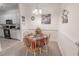 Charming dining area with a four-person table and chairs at 2033 Silvercrest Dr. # 21-A, Myrtle Beach, SC 29579