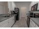 Galley kitchen with ample counter space and storage at 2033 Silvercrest Dr. # 21-A, Myrtle Beach, SC 29579