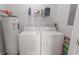 Laundry room with washer, dryer, and shelving at 2033 Silvercrest Dr. # 21-A, Myrtle Beach, SC 29579