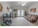 Living room with a cozy couch and access to the outside at 2033 Silvercrest Dr. # 21-A, Myrtle Beach, SC 29579