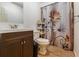 Clean bathroom with updated vanity and a floral shower curtain at 291 Frances Parker Rd., Georgetown, SC 29440