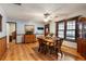 Bright dining room with hardwood floors, wood furniture, and large windows at 291 Frances Parker Rd., Georgetown, SC 29440