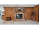 Brick fireplace with wood mantel in a wood paneled room at 291 Frances Parker Rd., Georgetown, SC 29440