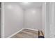 Small bedroom with wood-look flooring and ample wall space at 301 N Waccamaw Dr. # 109, Garden City Beach, SC 29576