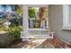 Relaxing white porch swing on the front porch at 313 Front St., Georgetown, SC 29440