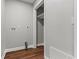 Small laundry room with shelving and new flooring at 412 E Melrose St., Mullins, SC 29574