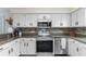 Kitchen with granite counters and stainless steel appliances at 4234 Sierra Ct. # 4234, Little River, SC 29566