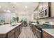 Spacious kitchen featuring an island and hardwood floors at 4551 Day Lily Run St., Myrtle Beach, SC 29579