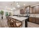 Modern kitchen with an island, stainless steel appliances, and ample counter space at 4551 Day Lily Run St., Myrtle Beach, SC 29579