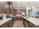 Modern kitchen with stainless steel appliances and an island at 4551 Day Lily Run St., Myrtle Beach, SC 29579