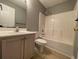 Bathroom with a shower/tub combo and light wood vanity at 4670 Southgate Pkwy., Myrtle Beach, SC 29579