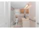 Bathroom with tub, toilet, sink, and a linen cabinet at 6001- Mh182 S Kings Hwy., Myrtle Beach, SC 29575