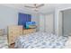 Bedroom with dresser, TV, and a bed featuring a blue fish pattern comforter at 6001- Mh182 S Kings Hwy., Myrtle Beach, SC 29575