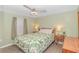 Spacious bedroom with a tropical-themed comforter and nightstands at 6001- Mh182 S Kings Hwy., Myrtle Beach, SC 29575