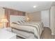 Bedroom with a king-size bed and white nightstands at 6001- Mh182 S Kings Hwy., Myrtle Beach, SC 29575