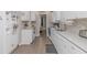 Modern kitchen with white cabinets and granite countertops at 6001- Mh182 S Kings Hwy., Myrtle Beach, SC 29575