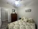 Bright bedroom with a queen bed and dresser at 6001-1886 S Kings Hwy., Myrtle Beach, SC 29575