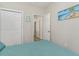 Bedroom with full bed and access to hallway at 6001-1886 S Kings Hwy., Myrtle Beach, SC 29575
