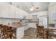 Well-equipped kitchen featuring white cabinets and a breakfast bar at 6001-1886 S Kings Hwy., Myrtle Beach, SC 29575