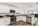Open concept kitchen with island, granite counters, and stainless steel appliances at 612 Pine Oaks Farm Rd., Aynor, SC 29511