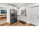 Kitchen area with stainless steel appliances and access to backyard at 612 Pine Oaks Farm Rd., Aynor, SC 29511