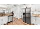 Kitchen with stainless steel refrigerator and granite countertops at 612 Pine Oaks Farm Rd., Aynor, SC 29511