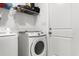 Laundry room with washer, dryer, and shelving at 612 Pine Oaks Farm Rd., Aynor, SC 29511