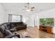 Comfortable living room, hardwood floors, and large TV at 612 Pine Oaks Farm Rd., Aynor, SC 29511