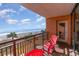 Balcony with ocean view and red chairs at 6900 N Ocean Blvd. # 316, Myrtle Beach, SC 29572