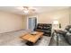 Living room with leather furniture and wood coffee table at 775 Plantation Dr. # 59, Little River, SC 29566