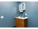 Clean office bathroom with wood vanity and mirror at 971 Mcnabb Rd., Loris, SC 29569