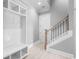 Bright entryway with built-in bench, storage, and staircase at 1017 Muscovy Pl., Conway, SC 29526